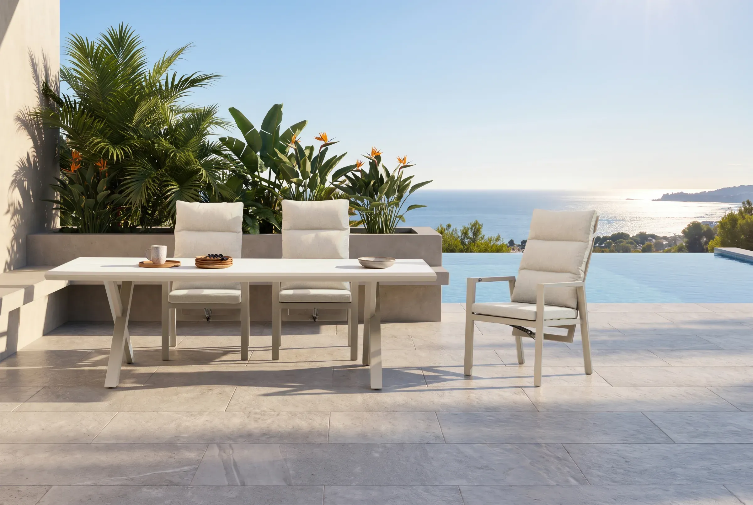 Linear REC Dining Table arranged in an outdoor setting