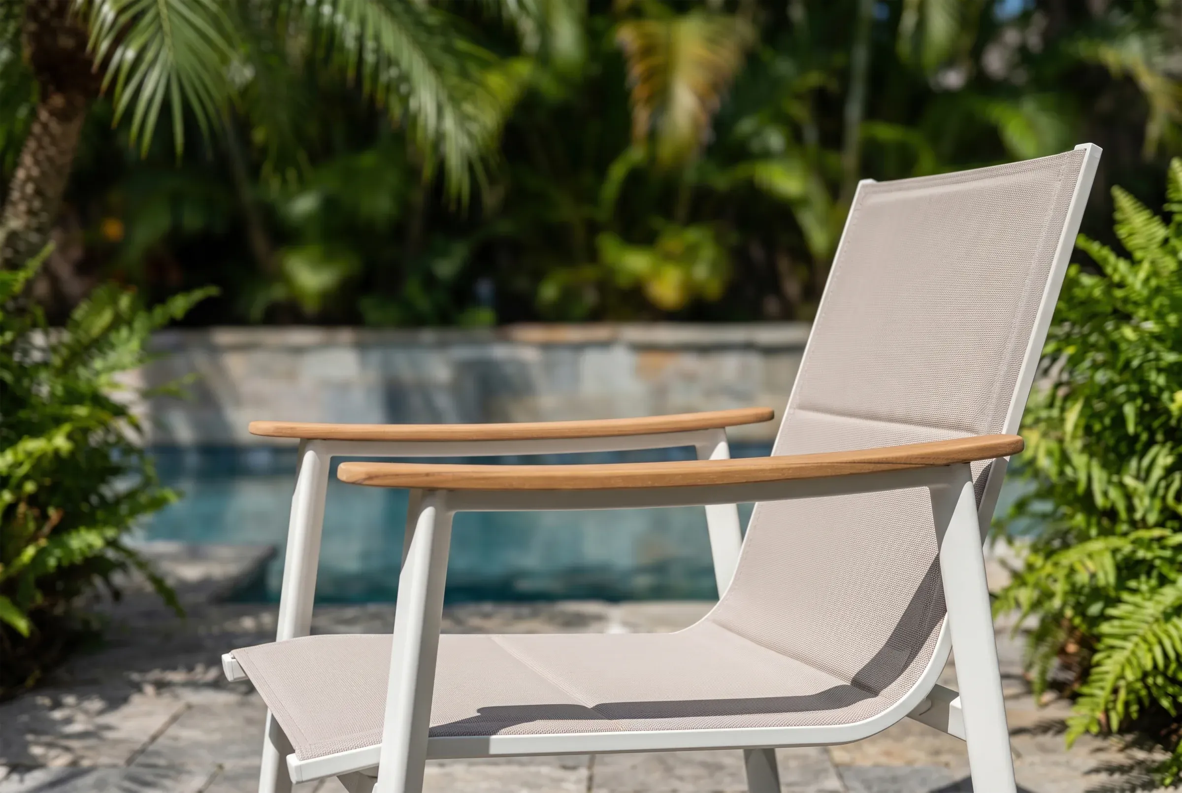 Breeze Dining Chair shown in an outdoor setting