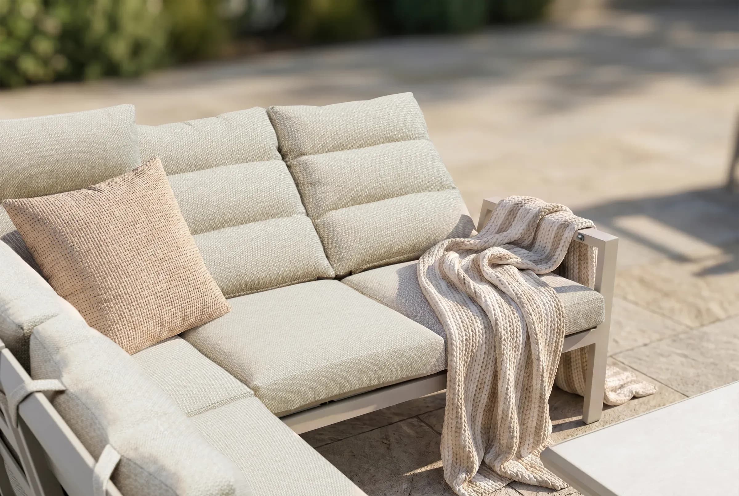 Linear Adjustable Corner Sofa Set shown in an outdoor setting