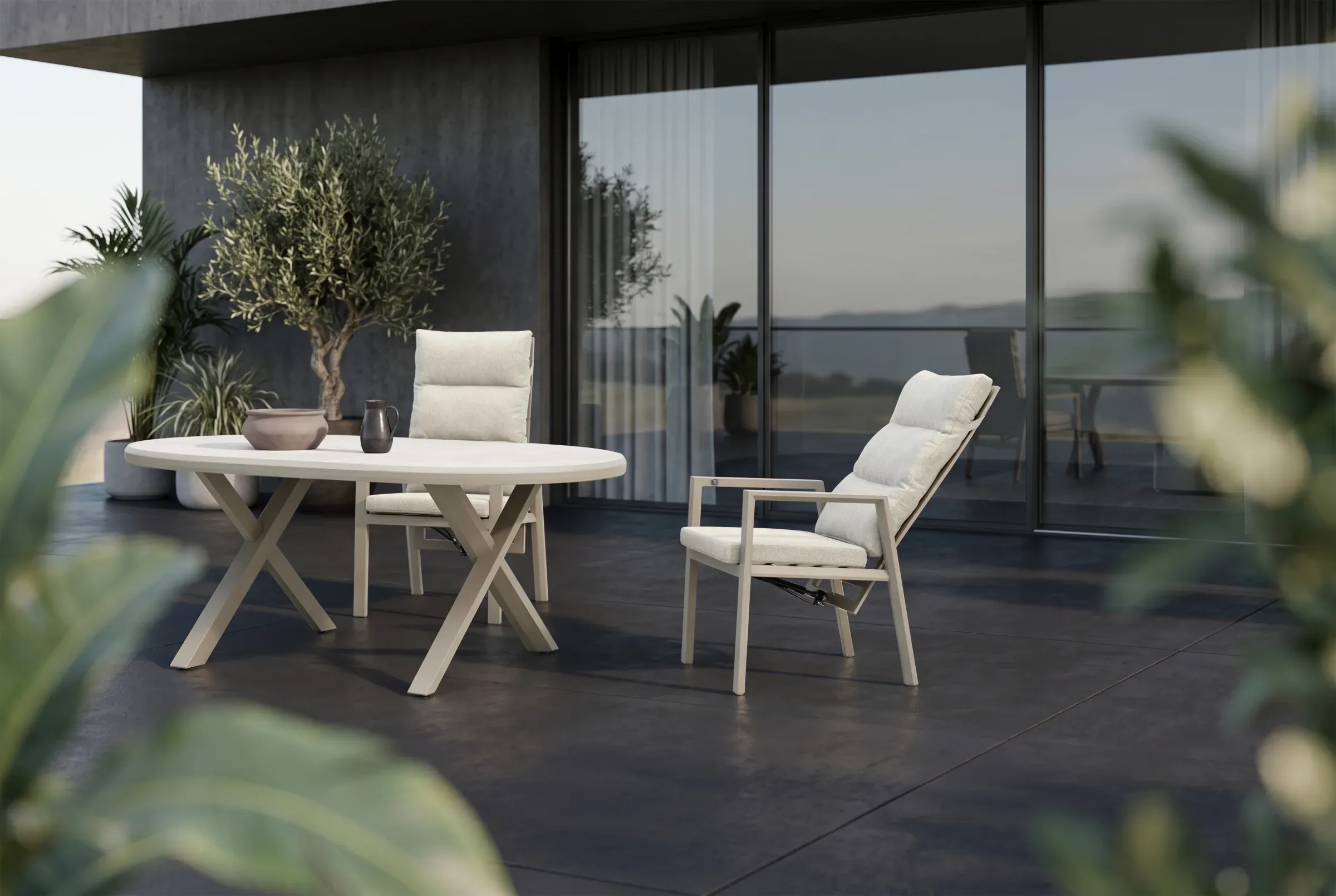 Linear Oval Dining Table arranged in an outdoor setting