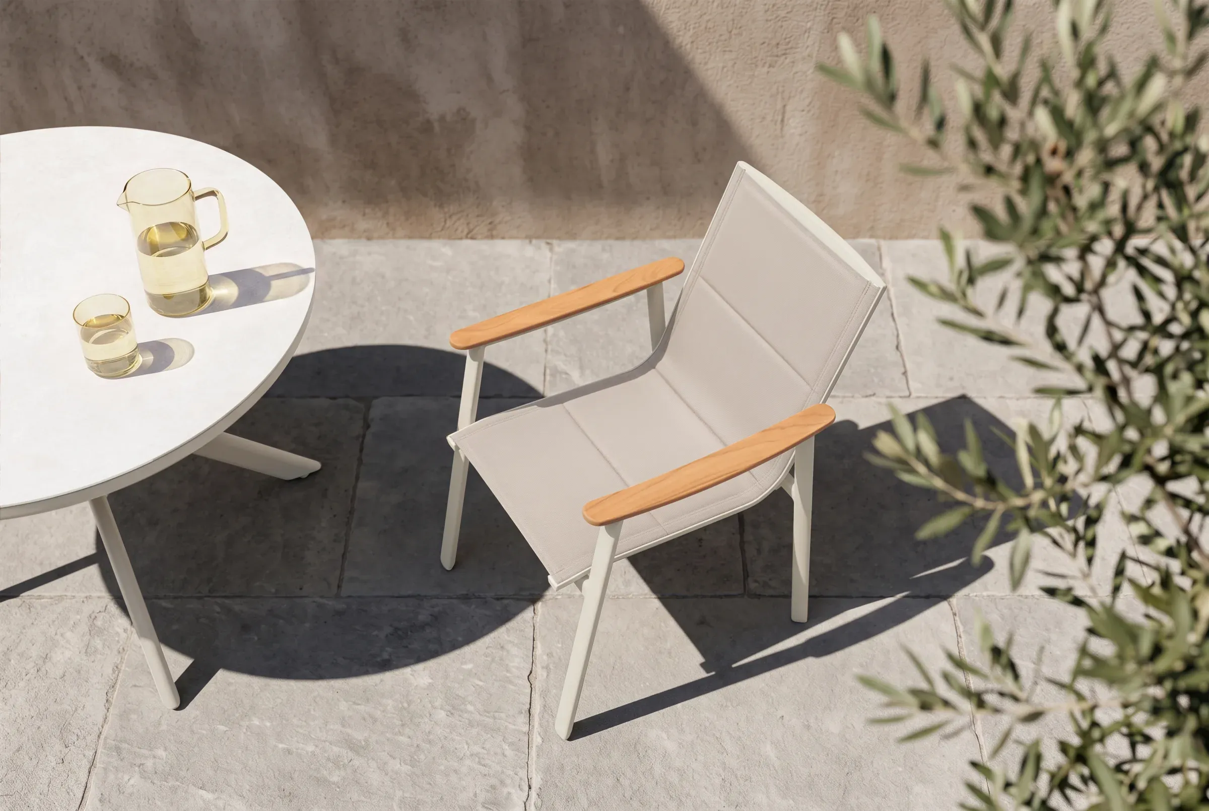 Breeze Dining Chair shown in an outdoor setting