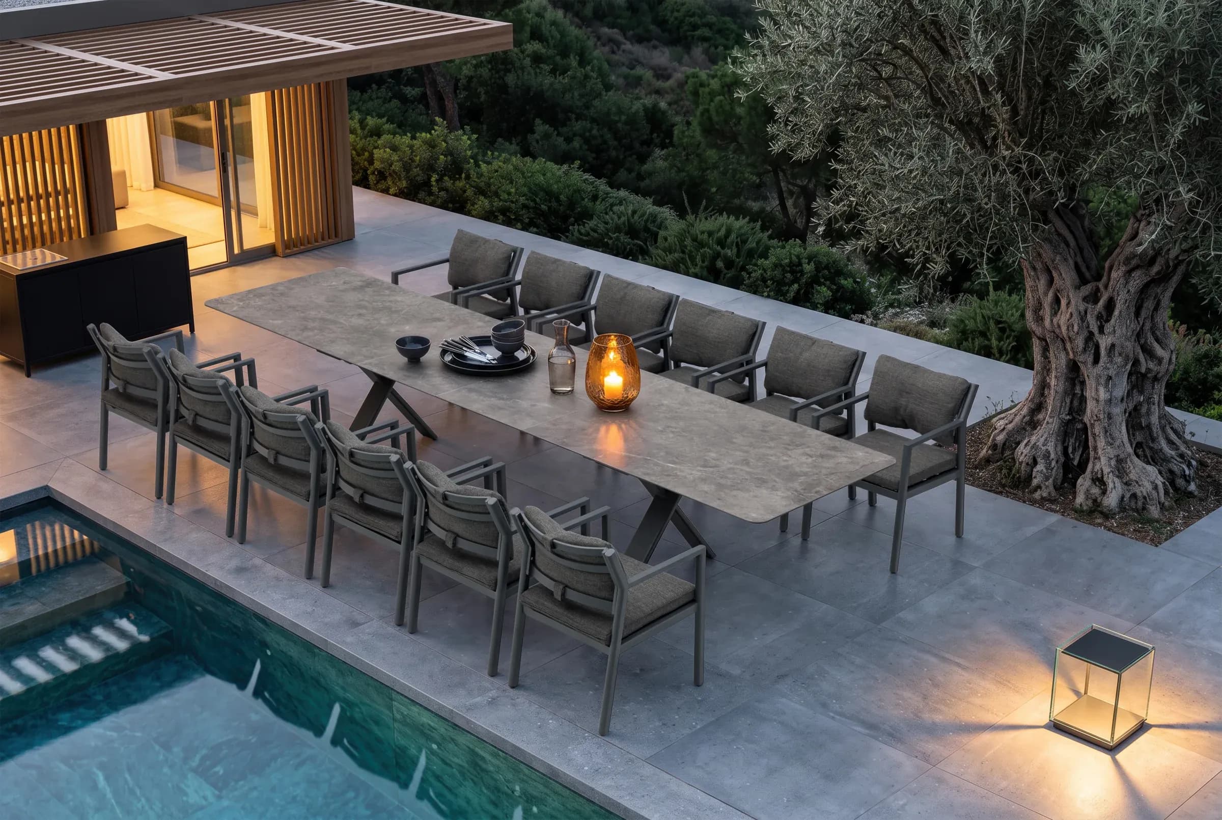 Apex REC Extending Dining Table arranged in an outdoor setting