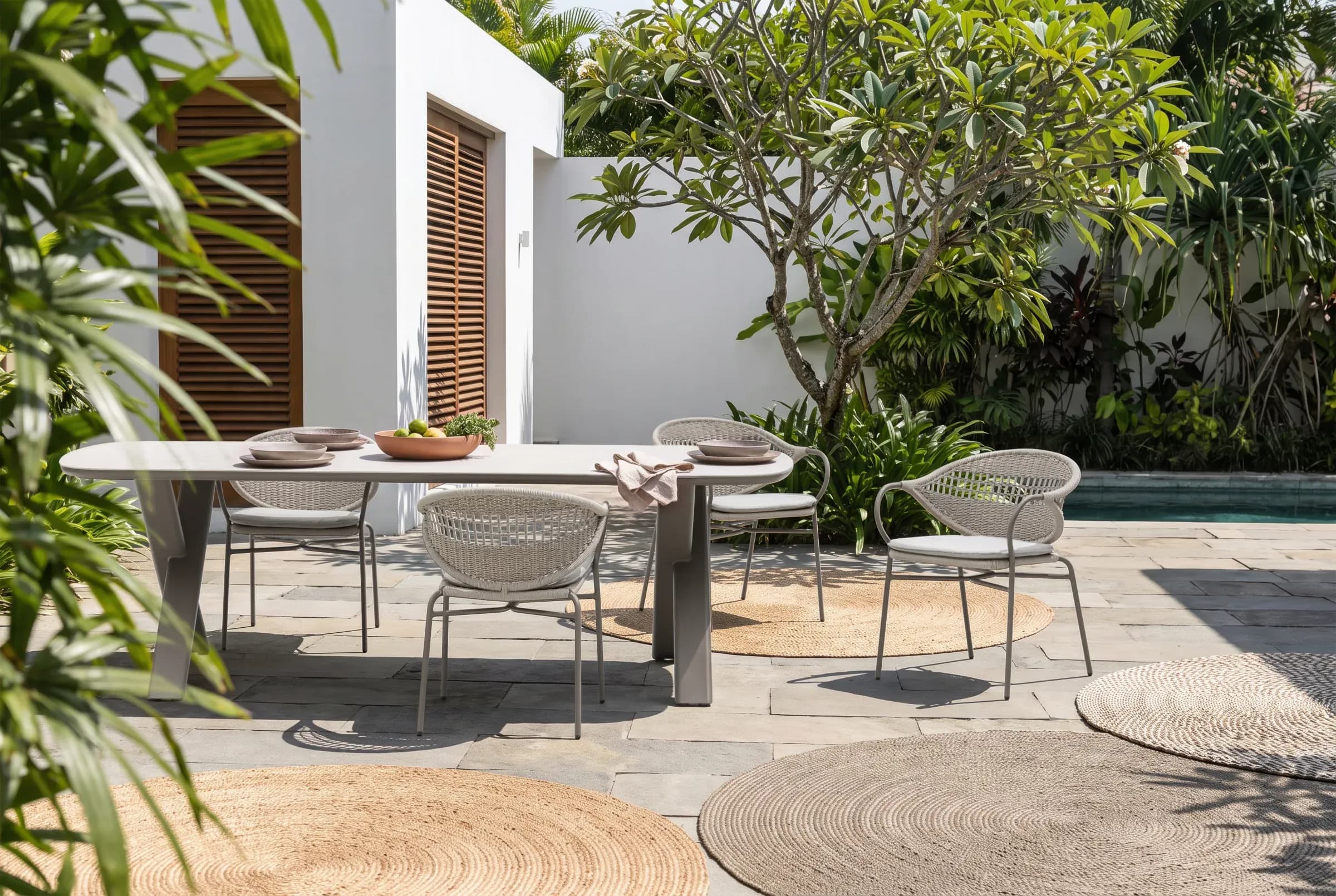 Cordo Dining Chair arranged in an outdoor setting