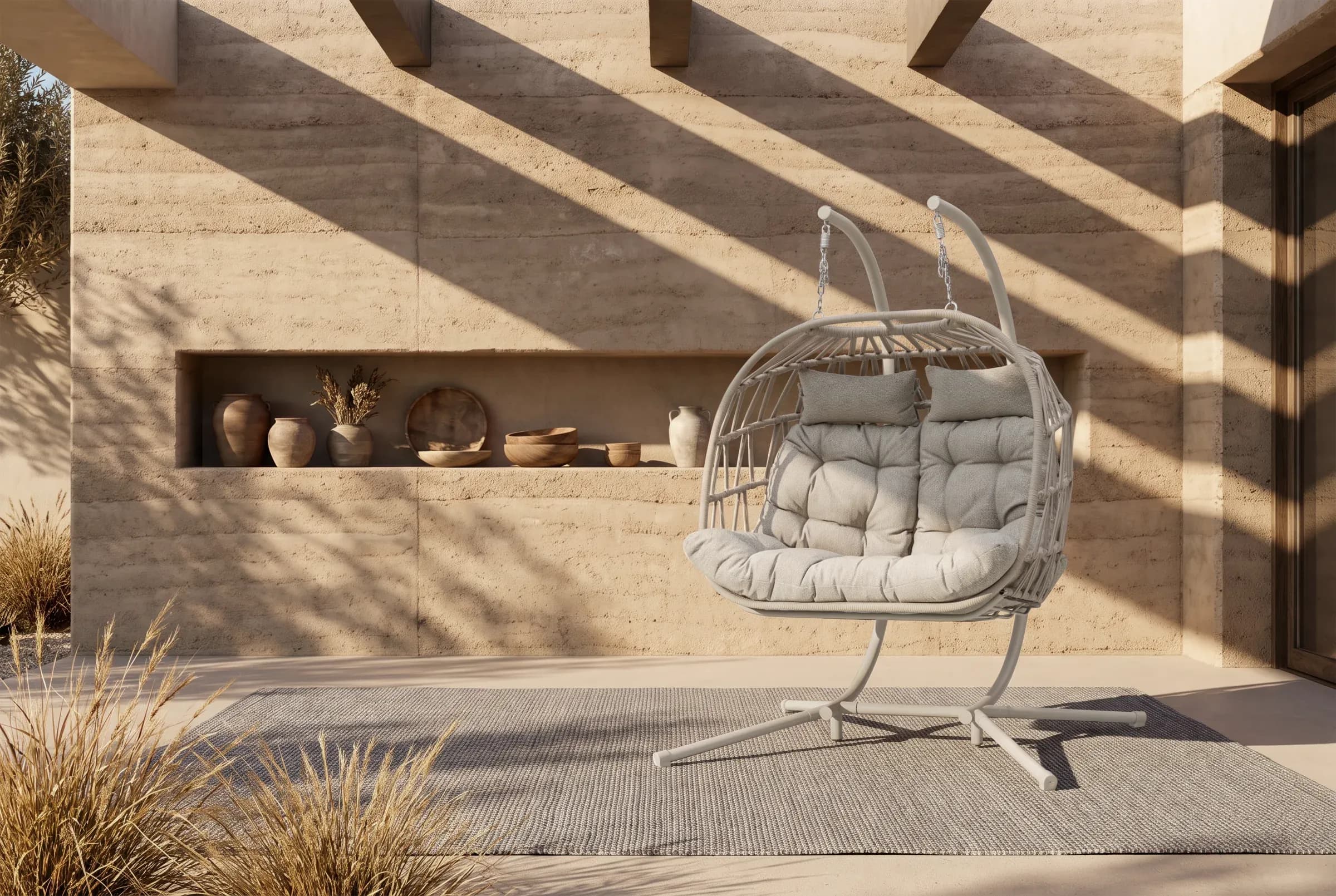 Ovo Swing Chair arranged in an outdoor setting