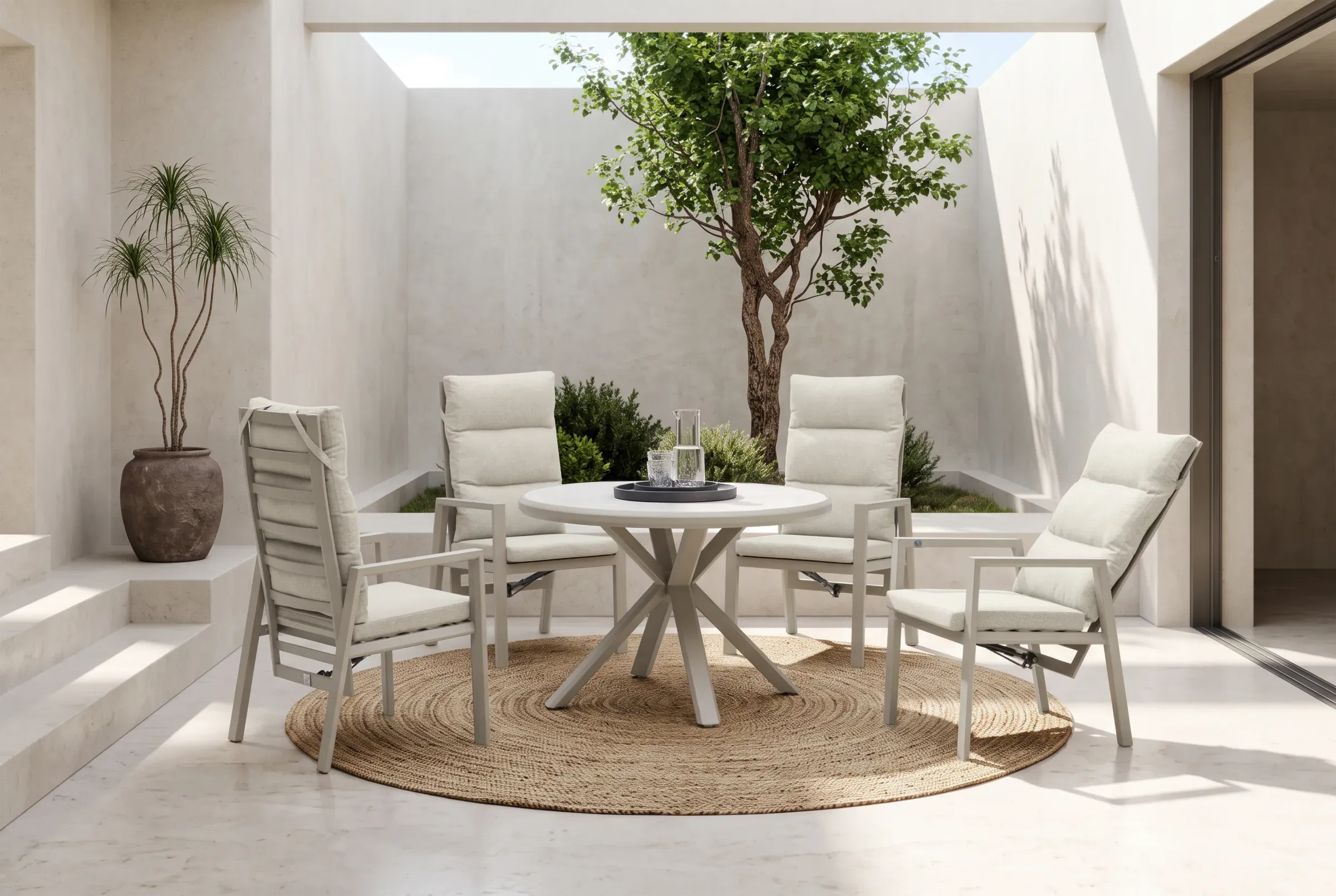 Linear Round Dining Table arranged in an outdoor setting