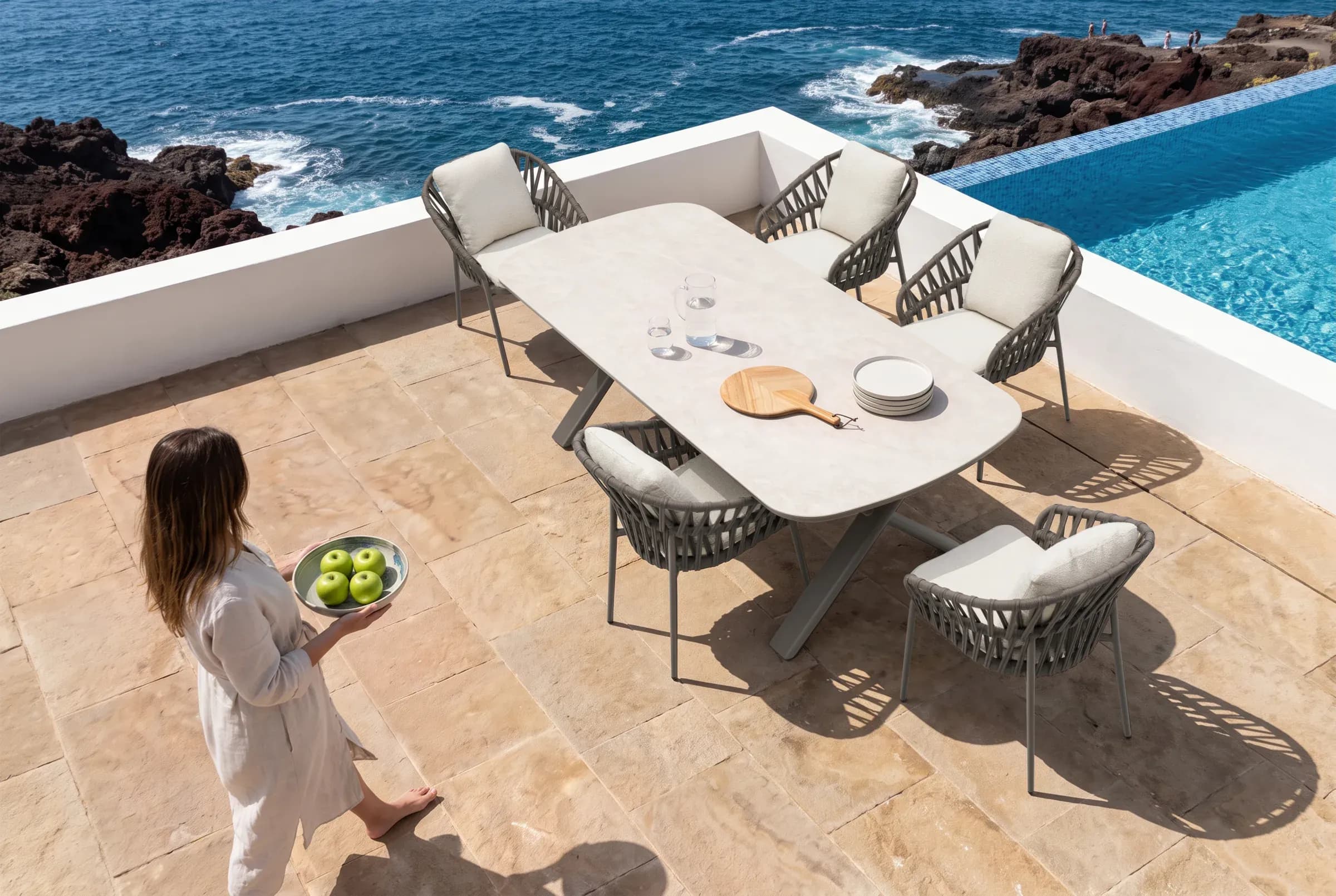 Lyra Dining Chair shown in an outdoor setting