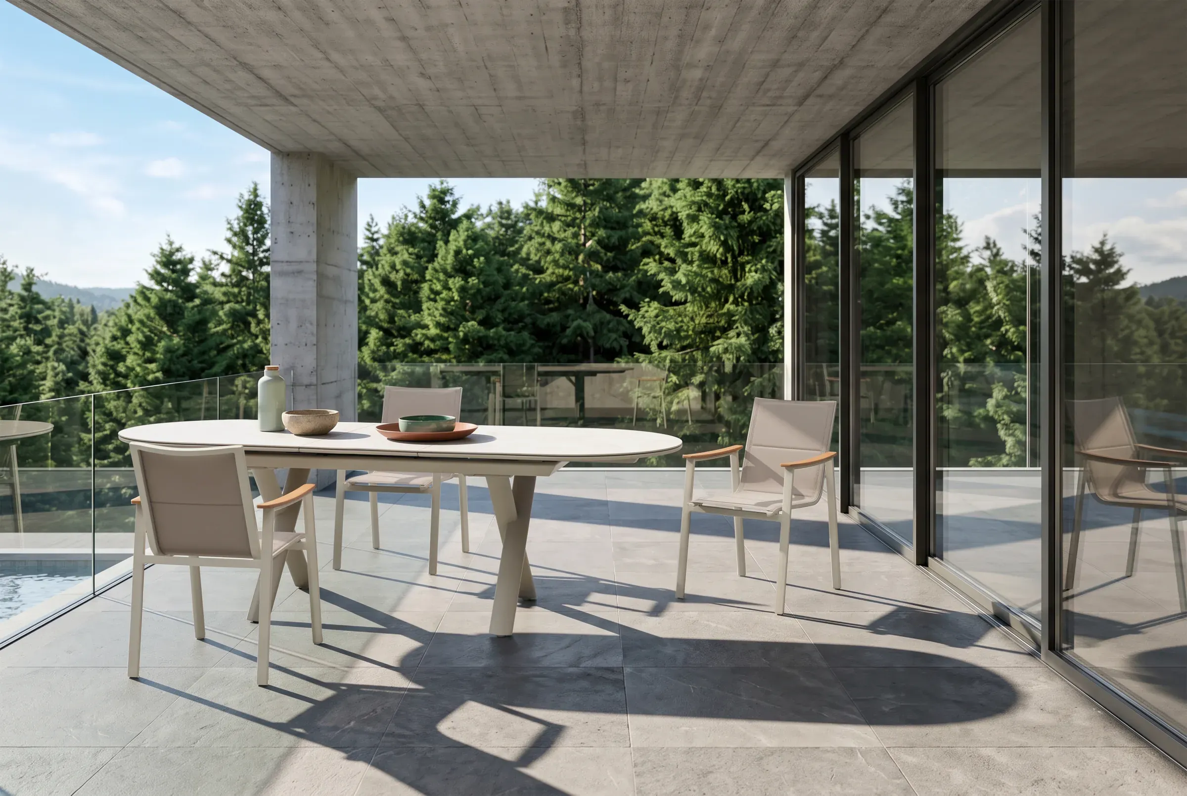 Apex 6-8 Seat Oval Extending Dining Table shown in an outdoor setting